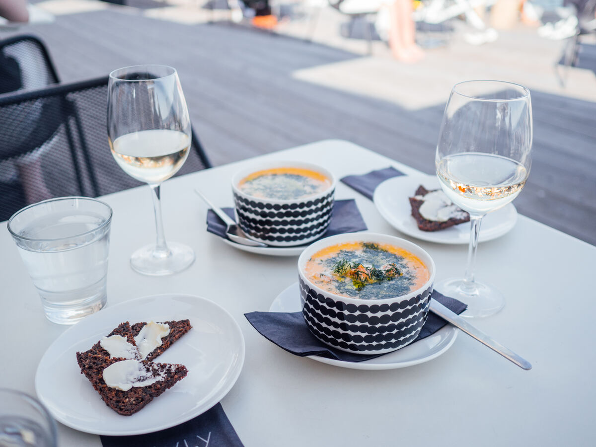 Salmon soup server at the terrace of Löyly restaurant in Helsinki.